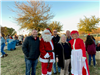 Council Members & City Administrator with Santa and Mrs. Claus