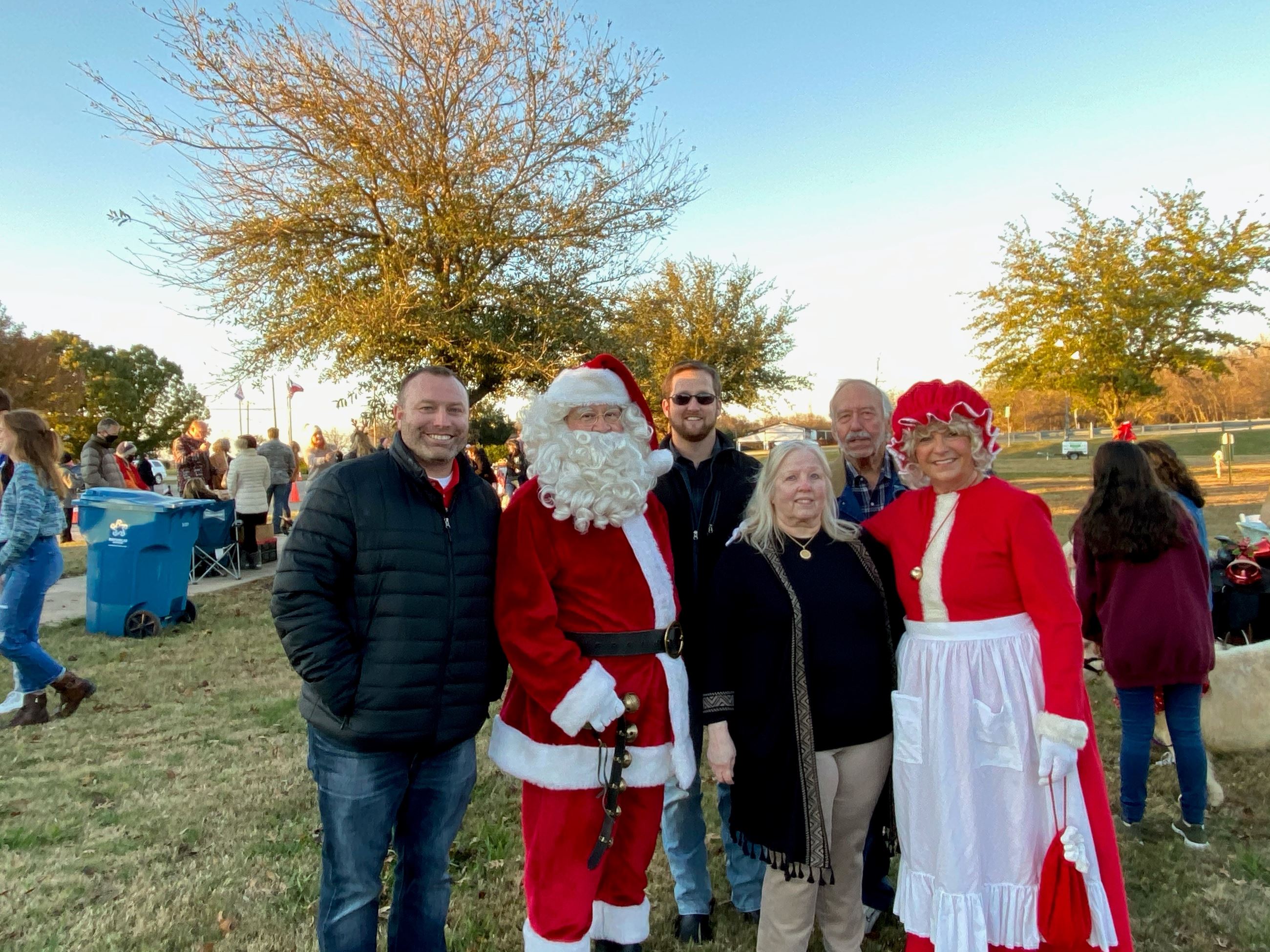 Council Members & City Administrator with Santa and Mrs. Claus